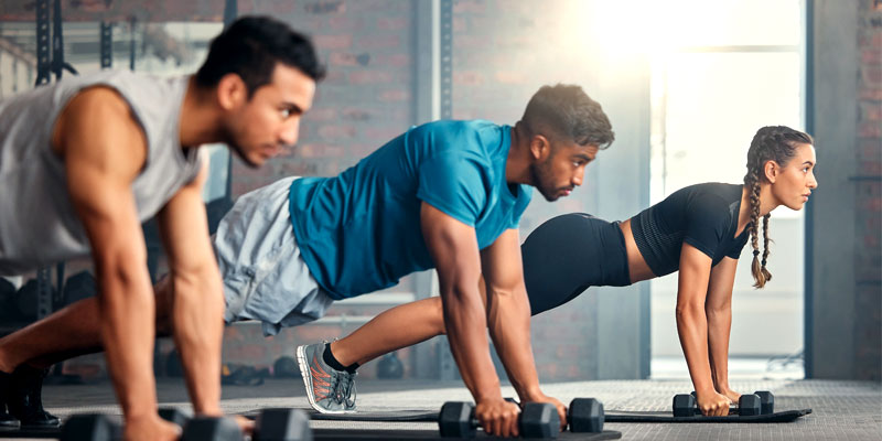 People in the gym doing exercises